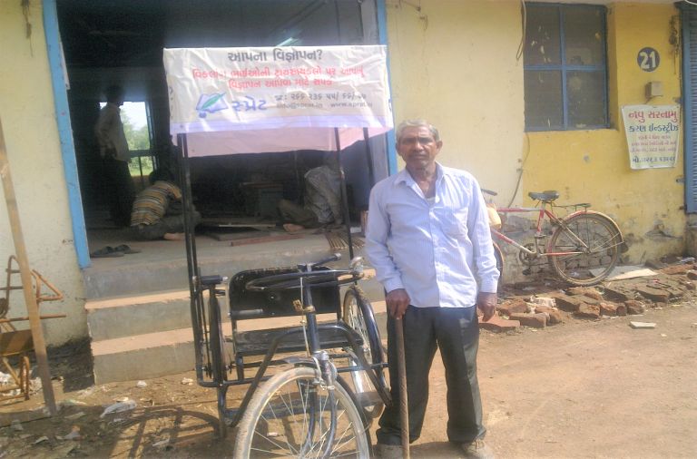 azmat (5)-benificiary-riding-tricycle
